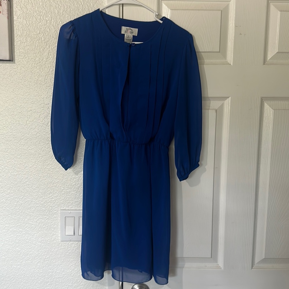 Used approximately 2 times. Large royal blue dress.